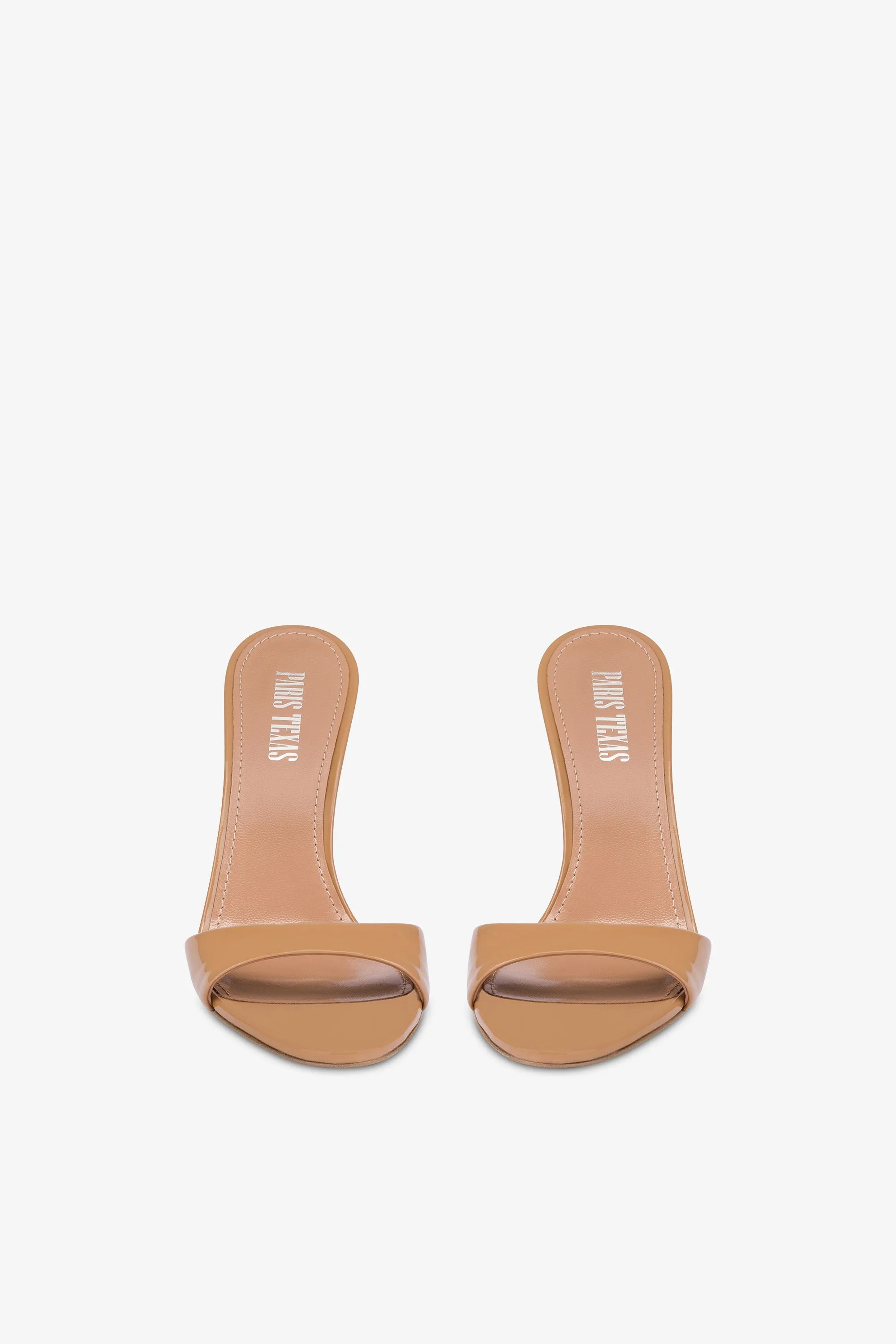 Almond-toe mules in patent caramel leather